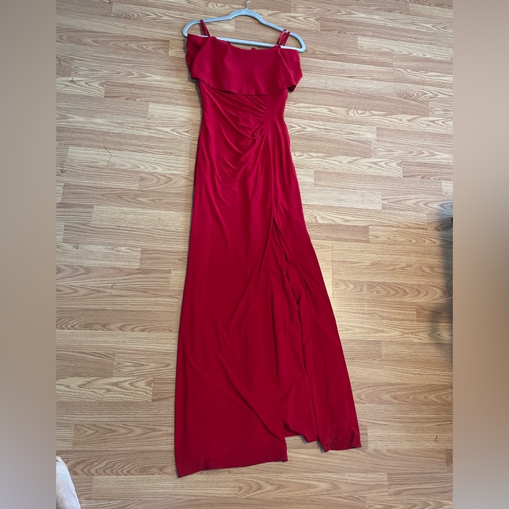 Red gown dress. Used. Bought it at Macys. Size 2.